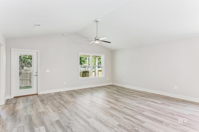 5885 Grotto Ave, Pensacola, FL 32507 - unfurnished living room featuring ceiling fan, vaulted ceiling, light wood finished floors, and baseboards