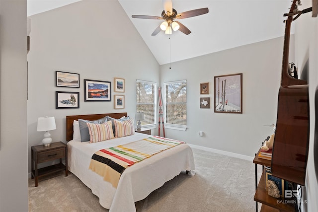 bedroom featuring ceiling fan, light colored carpet, baseboards, and high vaulted ceiling