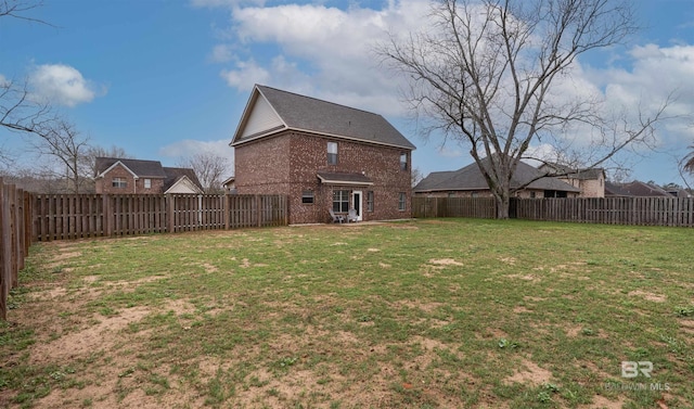 view of yard featuring a fenced backyard