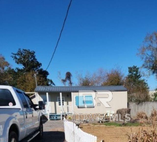 view of front of home with fence
