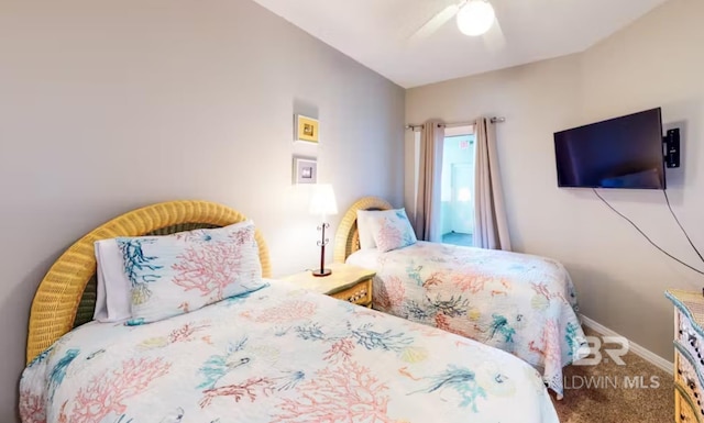 bedroom with carpet floors, baseboards, and a ceiling fan