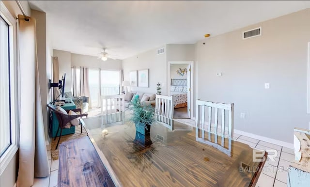 dining area featuring visible vents and baseboards