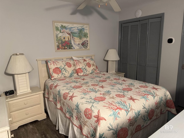 25805 Perdido Beach Blvd Unit 419, Orange Beach, AL 36561 - bedroom with dark wood-type flooring, a closet, and a ceiling fan