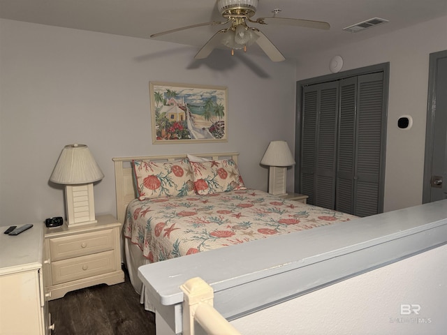 25805 Perdido Beach Blvd Unit 419, Orange Beach, AL 36561 - bedroom featuring dark wood-type flooring, a closet, ceiling fan, and visible vents