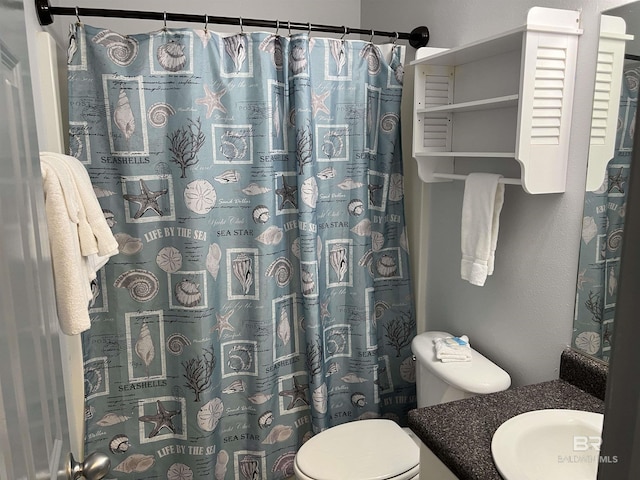 25805 Perdido Beach Blvd Unit 419, Orange Beach, AL 36561 - full bathroom with toilet, vanity, and a shower with shower curtain