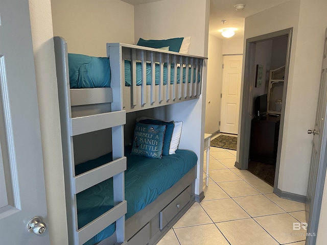 25805 Perdido Beach Blvd Unit 419, Orange Beach, AL 36561 - tiled bedroom featuring baseboards