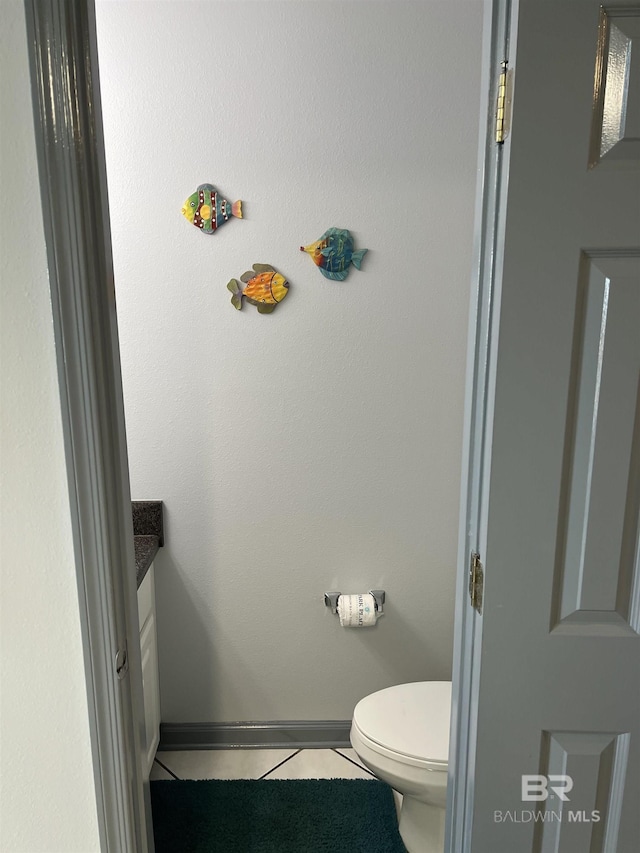 25805 Perdido Beach Blvd Unit 419, Orange Beach, AL 36561 - bathroom with toilet, vanity, baseboards, and tile patterned flooring