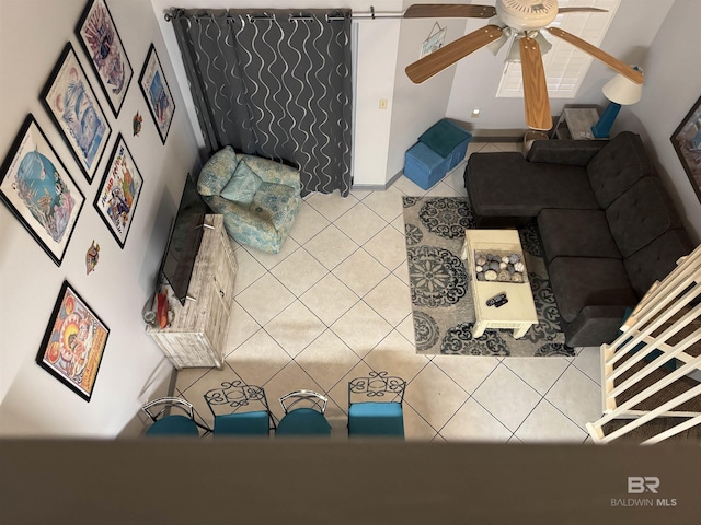 25805 Perdido Beach Blvd Unit 419, Orange Beach, AL 36561 - living room with a ceiling fan and tile patterned flooring