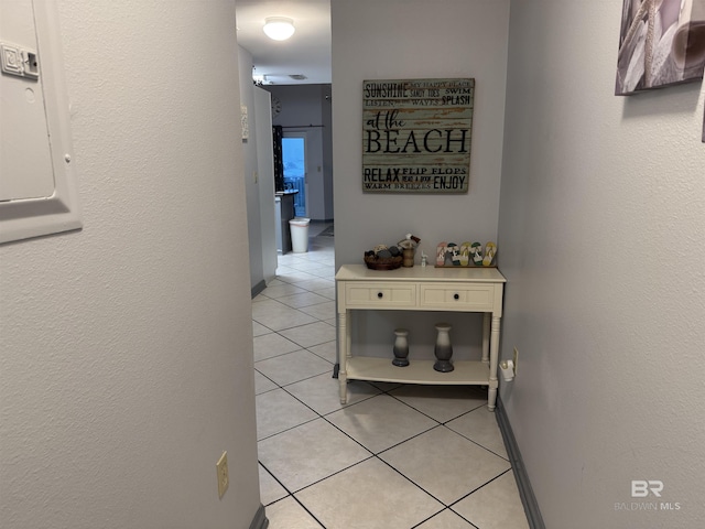 25805 Perdido Beach Blvd Unit 419, Orange Beach, AL 36561 - corridor with light tile patterned floors and electric panel