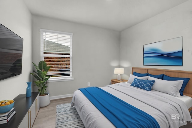 bedroom featuring light wood-type flooring