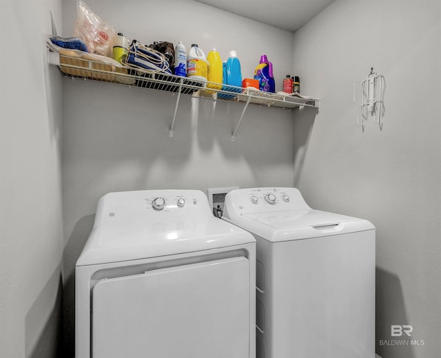 laundry area featuring washer and clothes dryer