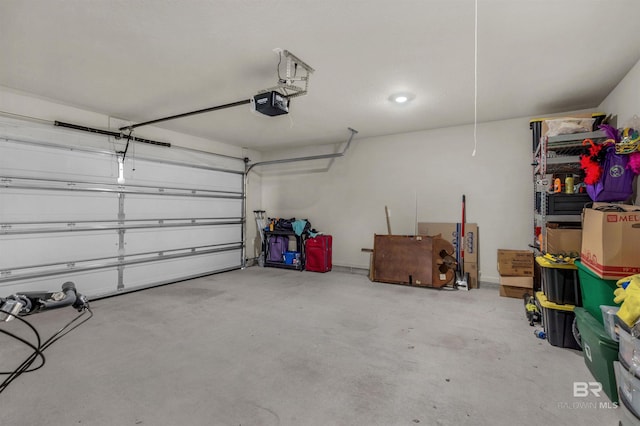 garage featuring a garage door opener