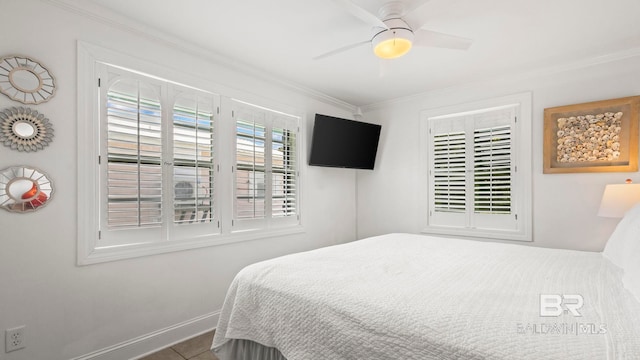 331 E 2nd Ave, Gulf Shores, AL 36542 - bedroom with ornamental molding, baseboards, and ceiling fan