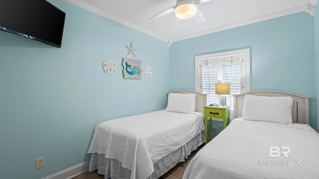 331 E 2nd Ave, Gulf Shores, AL 36542 - bedroom featuring ornamental molding, a ceiling fan, and baseboards