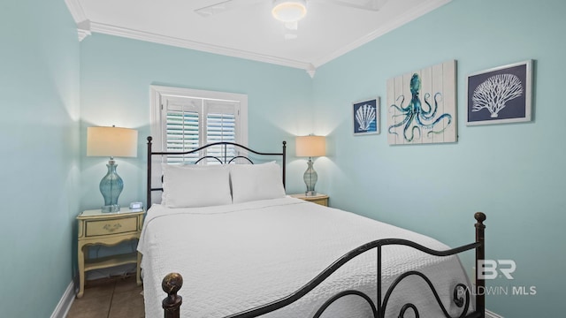 331 E 2nd Ave, Gulf Shores, AL 36542 - tiled bedroom featuring crown molding, baseboards, and ceiling fan
