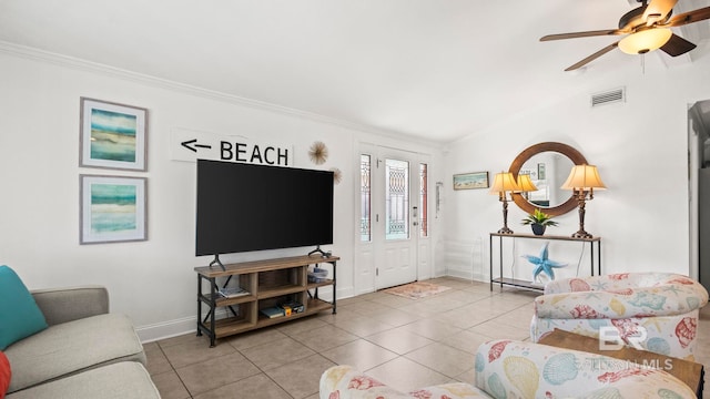 331 E 2nd Ave, Gulf Shores, AL 36542 - living room featuring ornamental molding, tile patterned floors, baseboards, and ceiling fan