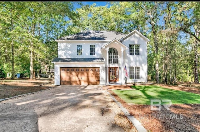 view of front property with a garage