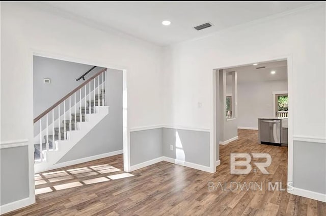 empty room with hardwood / wood-style floors