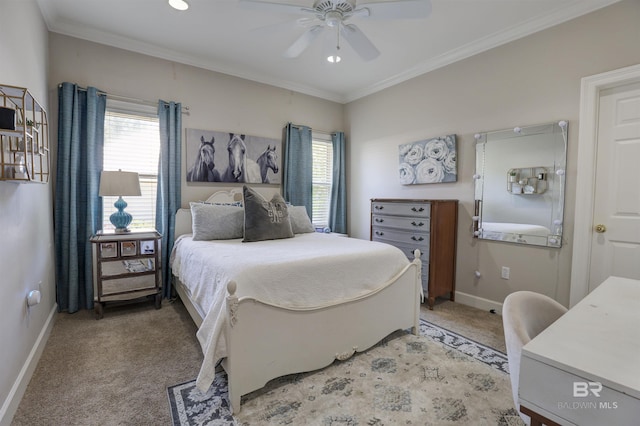 carpeted bedroom featuring ceiling fan and ornamental molding