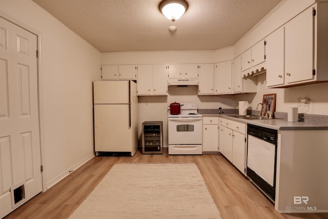 kitchen featuring light hardwood / wood-style flooring, custom exhaust hood, wine cooler, sink, and white appliances