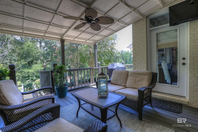 exterior space with ceiling fan and lofted ceiling