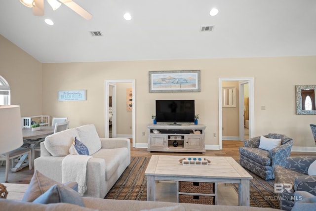 living room with visible vents, recessed lighting, and light wood-style floors