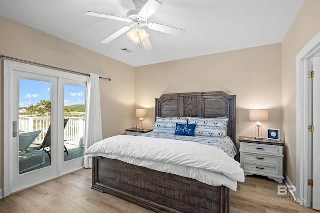 bedroom with access to exterior, light wood-style flooring, a ceiling fan, and baseboards