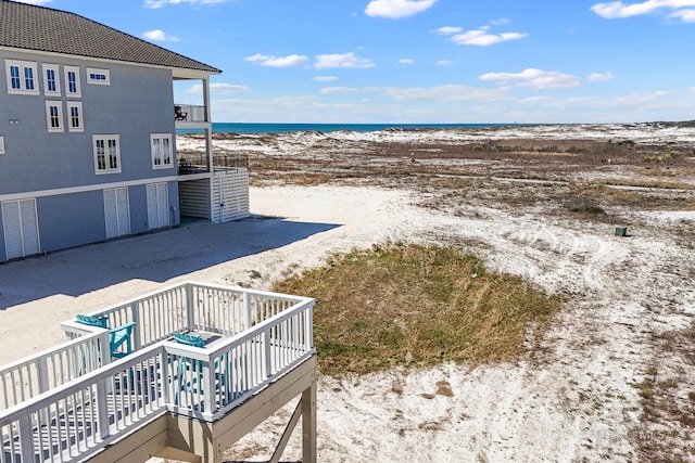 property view of water featuring a beach view