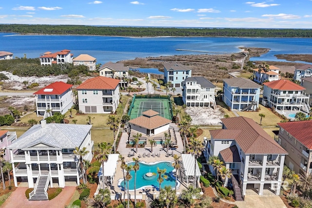 bird's eye view featuring a residential view and a water view