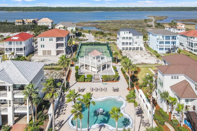 aerial view featuring a residential view and a water view