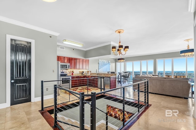 dining space featuring light tile patterned flooring, a notable chandelier, visible vents, baseboards, and crown molding