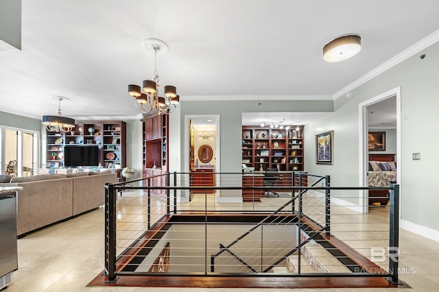 dining area with built in features, crown molding, an inviting chandelier, tile patterned flooring, and baseboards