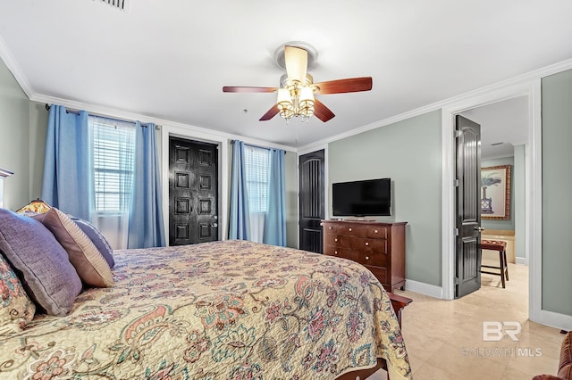 bedroom with ornamental molding, ceiling fan, and baseboards