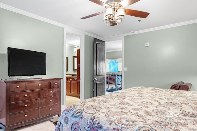 bedroom with a ceiling fan, light colored carpet, crown molding, and ensuite bathroom