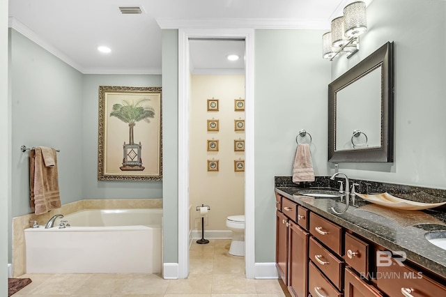 bathroom with visible vents, toilet, a garden tub, tile patterned flooring, and a sink