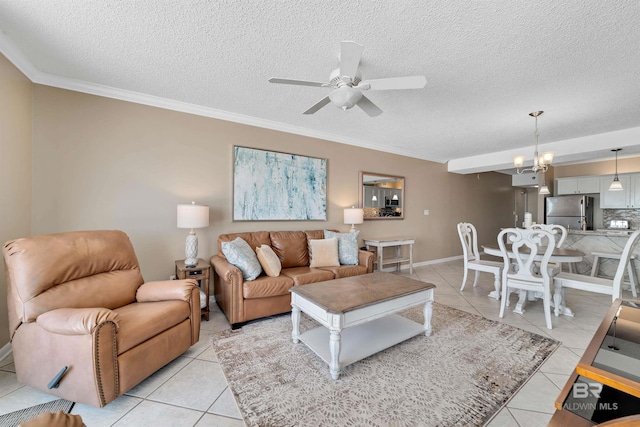 24720 Perdido Beach Blvd Unit 504, Orange Beach, AL 36561 - living area featuring light tile patterned floors, a ceiling fan, ornamental molding, a textured ceiling, and baseboards