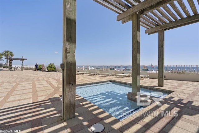 24720 Perdido Beach Blvd Unit 504, Orange Beach, AL 36561 - community pool with a patio area and fence