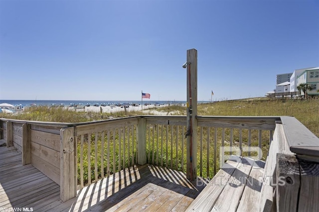 24720 Perdido Beach Blvd Unit 504, Orange Beach, AL 36561 - wooden terrace featuring a water view