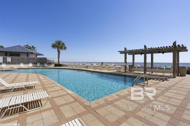 24720 Perdido Beach Blvd Unit 504, Orange Beach, AL 36561 - community pool with a pergola, a patio, and fence