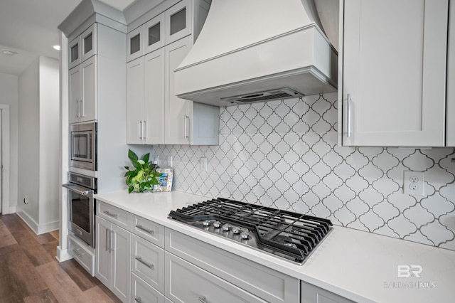 30531 Ono N Loop W, Orange Beach, AL 36561 - kitchen with premium range hood, stainless steel appliances, light countertops, decorative backsplash, and recessed lighting