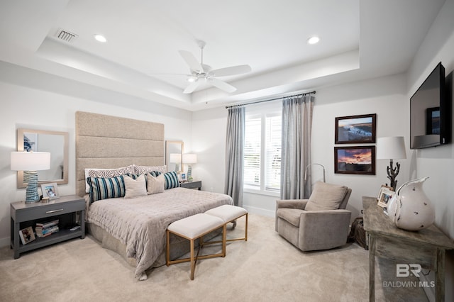 30531 Ono N Loop W, Orange Beach, AL 36561 - bedroom with a tray ceiling, light colored carpet, recessed lighting, and a ceiling fan