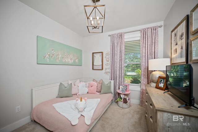 30531 Ono N Loop W, Orange Beach, AL 36561 - carpeted bedroom featuring a chandelier and baseboards