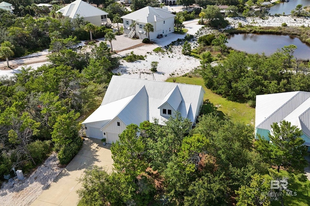 30531 Ono N Loop W, Orange Beach, AL 36561 - aerial view of residential area featuring a nearby body of water and a tree filled landscape