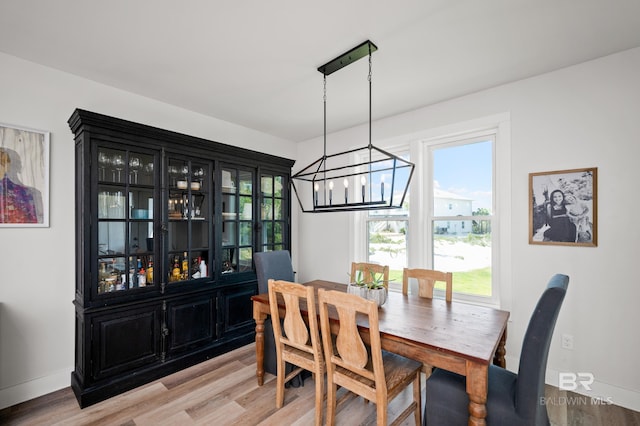 30531 Ono N Loop W, Orange Beach, AL 36561 - dining room with a chandelier and light wood finished floors