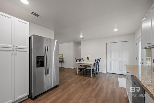169 Buena Vista Dr, Daphne, AL 36526 - kitchen featuring stainless steel fridge with ice dispenser, recessed lighting, dark wood finished floors, light stone countertops, and baseboards