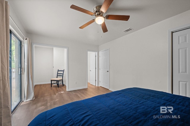 169 Buena Vista Dr, Daphne, AL 36526 - bedroom featuring wood finished floors and baseboards