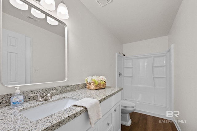 169 Buena Vista Dr, Daphne, AL 36526 - full bath with vanity, wood finished floors, toilet, and shower / washtub combination