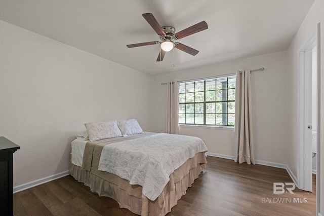 169 Buena Vista Dr, Daphne, AL 36526 - bedroom with dark wood-type flooring, baseboards, and a ceiling fan
