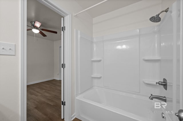 169 Buena Vista Dr, Daphne, AL 36526 - bathroom with washtub / shower combination, wood finished floors, baseboards, and ceiling fan