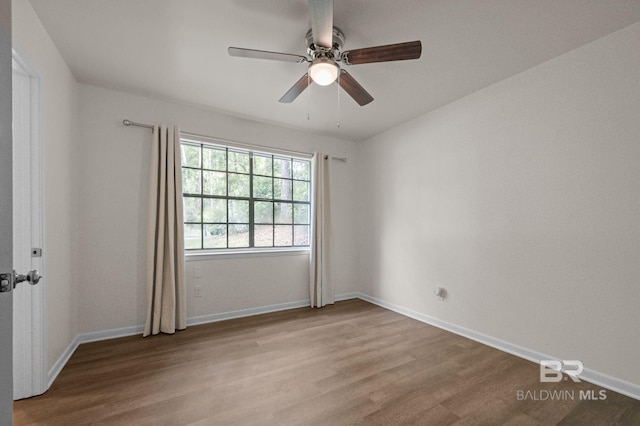 169 Buena Vista Dr, Daphne, AL 36526 - unfurnished room with wood finished floors, ceiling fan, and baseboards